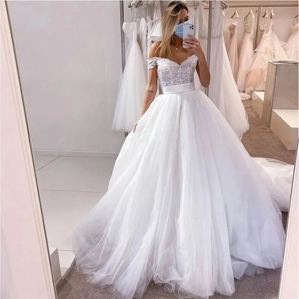 

Customized ZJ9390 Customized Backless Mermaid Bride Dresses with Long Lace Tail Spaghetti Straps Slim Fitting Sexy Wedding Dress
