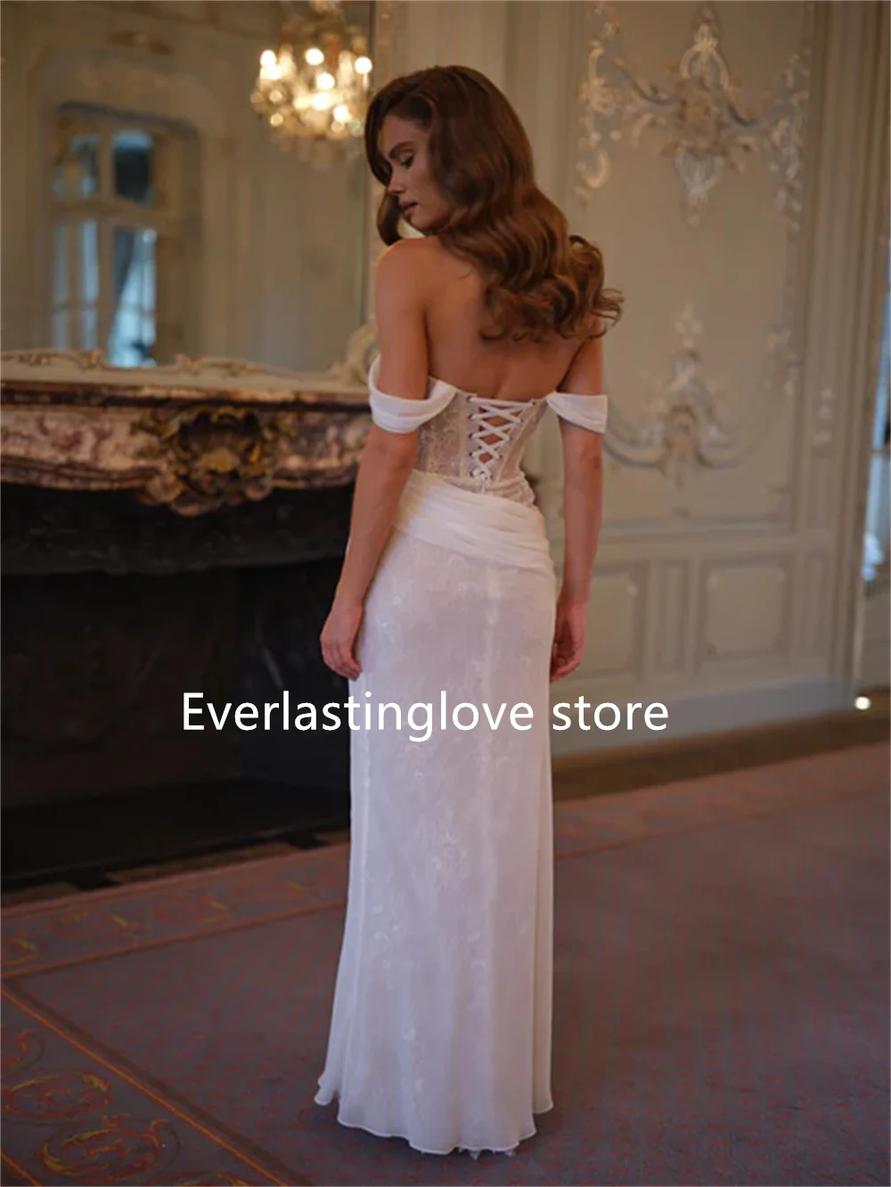 ชุดแต่งงานแบบเรียบง่ายเปิดไหล่ทรงหวานประดับลูกไม้เต็มตัว คอร์เซ็ทสั่งตัดได้ ปี 2026 รุ่น Rode De Morrie