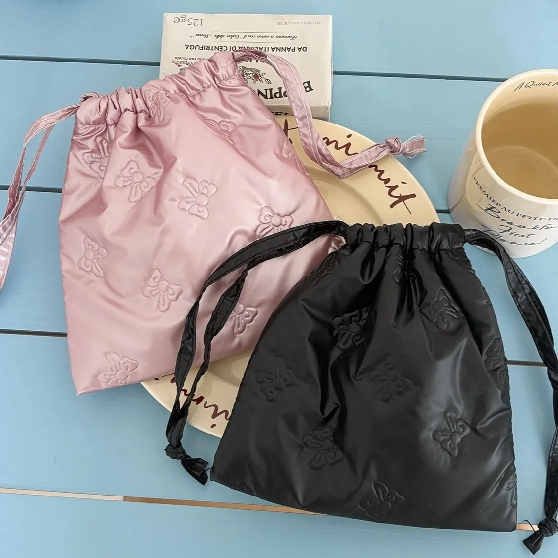 PU leather bow drawstring pocket, waterproof portable, miscellaneous items, lipstick storage, makeup bag