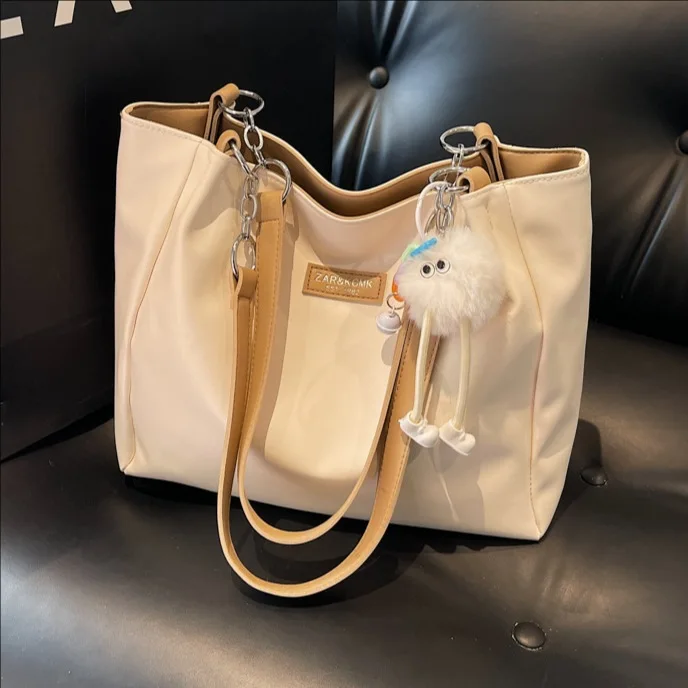 

2025 Elevated Essentials Tote - The Modern Professional's Statement Carryall