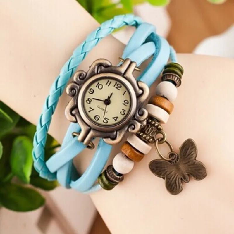 

Лидер продаж, винтажные часы на внешней торговле, модные женские часы с покрытием из воловьей кожи, подвеска в виде подсолнуха и бабочки, студенческий аксессуар