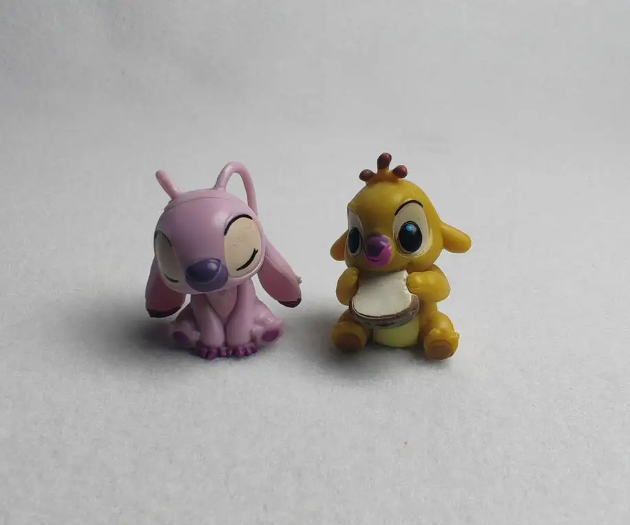 8 pezzi 3-4 cm Lilo & Stitch cartone animato carino figura modello collezione Anime ornamento da tavolo decorazione torta di compleanno giocattoli per bambini regali