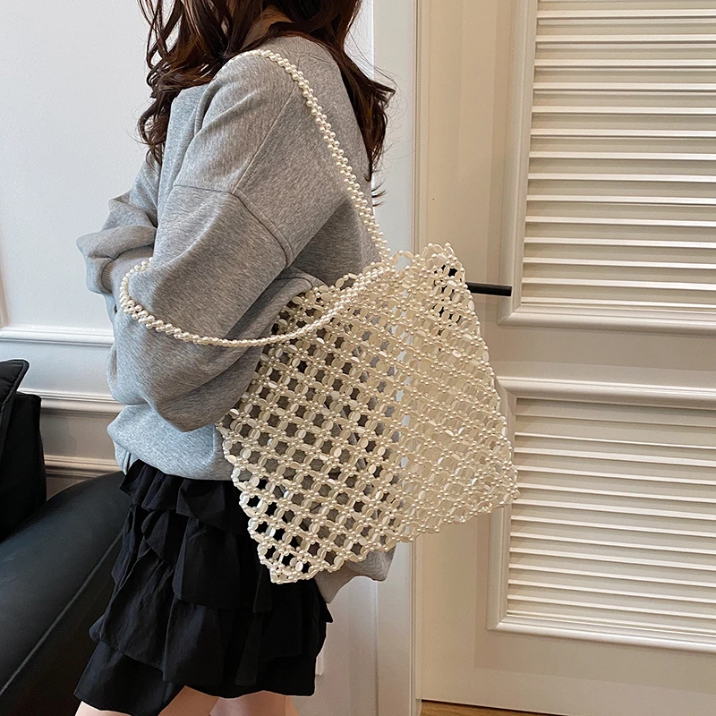 

Exquisite Hot Sale New No Zipper Acrylic Square Shoulder Bags 2025 Fashion Bead Sense of Luxury Hollow Out Women‘s Handbags