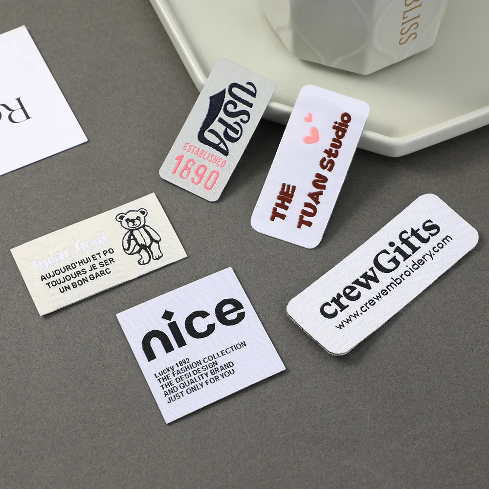

Customized Garment Woven Labels Washable Care Embroidered Damask Label Brand Logo Clothing Tag Custom