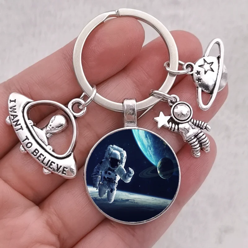 Astronaut keychain Outer Space Starry Galaxy keychain Solar System Planet Universe Glass Keychain UFO Key Ring Spaceman Keychain