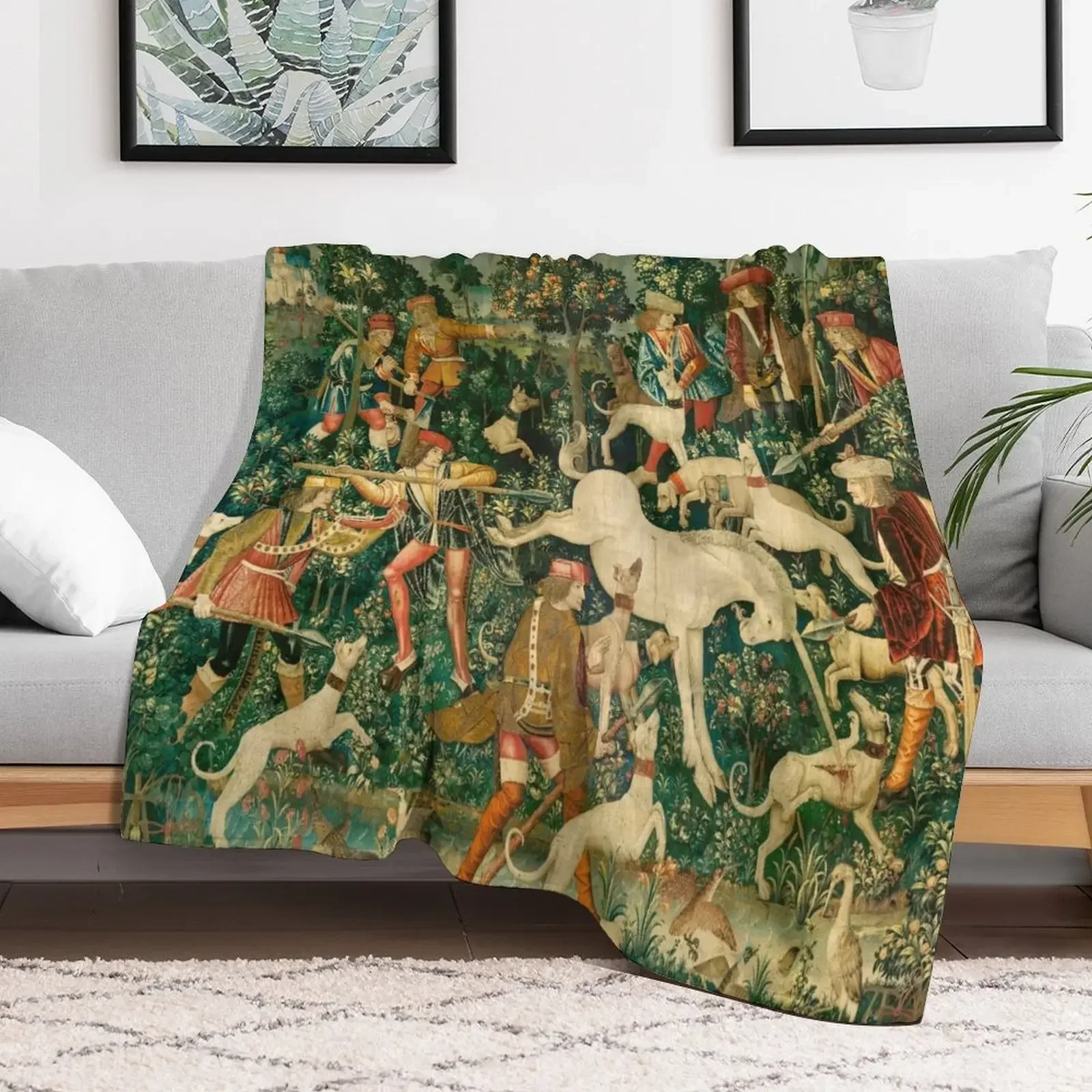 The Hunt of the Unicorn Tapestry. The unicorn defends himself (From Unicorn tapestries) Throw Blanket