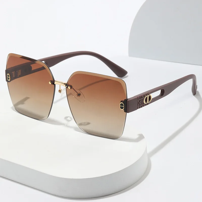 

​​2025 New Geometric Rimless Sunglasses Women, Square Hollow-Out UV400 Polarized for Driving & Street Style​​
