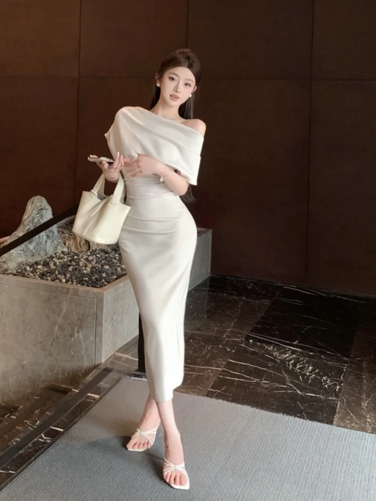 

Сексуальное облегающее женское платье с коротким рукавом для ранней весны, подчеркивающее фигуру, с завышенной талией и юбкой, подчеркивающей бедра, элегантное, индивидуальное.