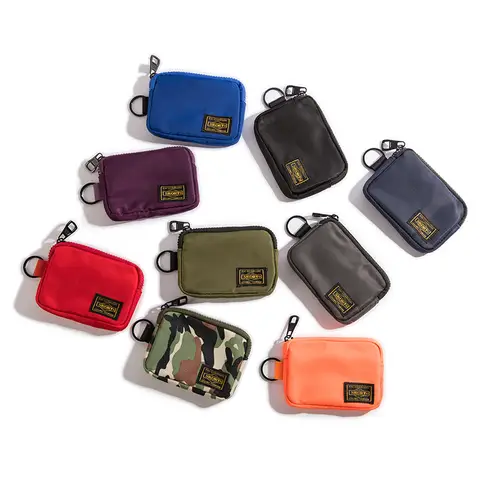 학생증, 출입증, 운전면허증, 이어폰, 카드, 지갑, 열쇠, 동전 등을 보관할 수 있는 심플한 디자인의 수납 가방