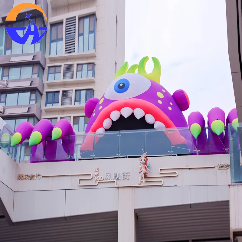 

Halloween inflatable luminous purple monster crawling on the rooftop for shopping mall and bar doorways and rooftops