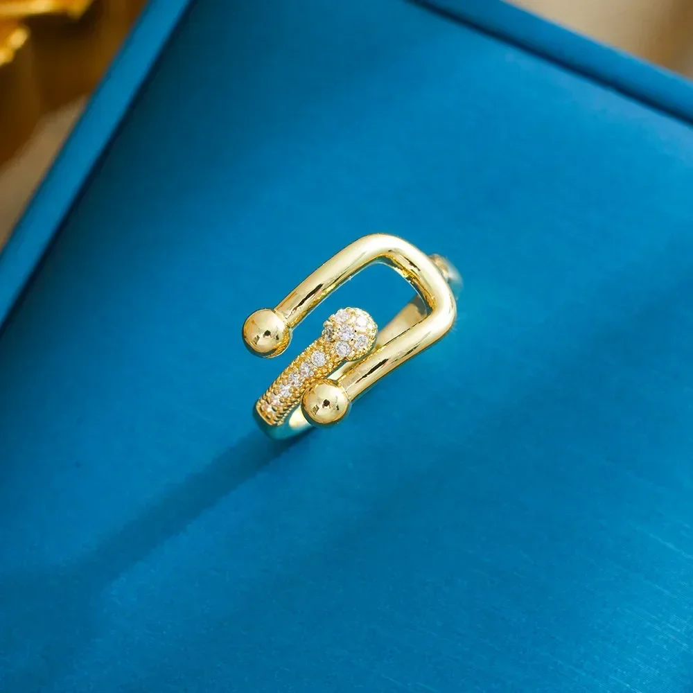 

2025 2025newHot-selling diamond horseshoe buckle open ring for women, zircon leaf ring for women, exuding a sense of luxury