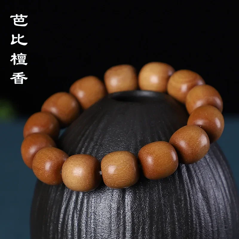 Old pearl purple sandalwood gold silk nan huanghua pear green sandalwood blood sandalwood hand string men and women handicraft