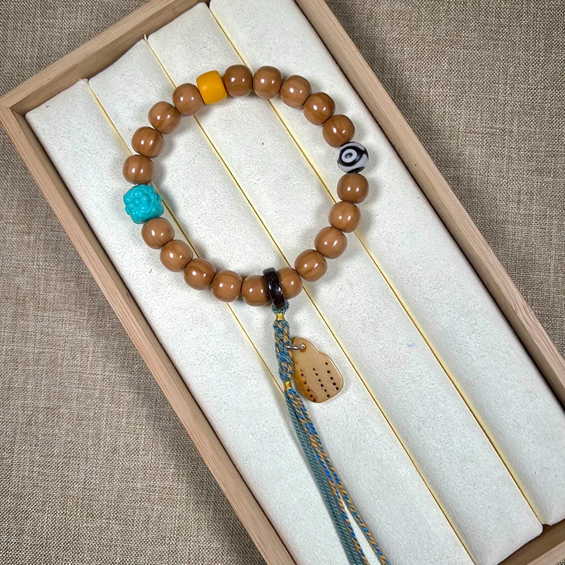 Pulsera de cuentas con cabeza de mono tibetano, cuentas de hueso turquesa, joyería de estilo simple para hombres y mujeres, con decoración de borlas.