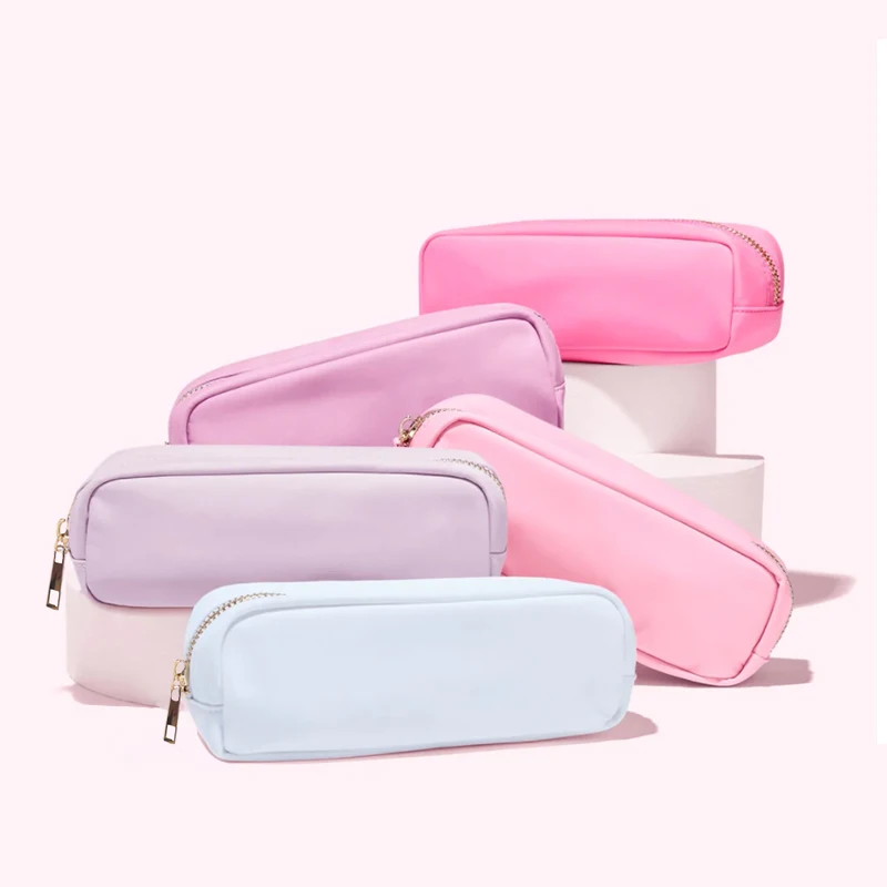 Mini organizador de maquillaje de viaje de diseño, bolsas de cosméticos impermeables, bolsas de nailon coloridas para bolígrafos, suministros de