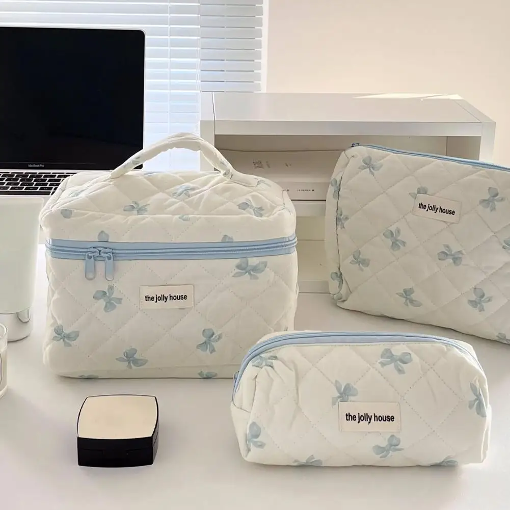 Borsa cosmetica borsa per il trucco con fiocco bianco piccola borsa da toilette portatile per studenti fresca e carina borsa da toilette trapuntata