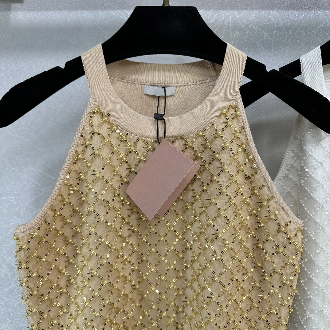 

Women's ClothingNew spring and summer vacation series! Heavy-duty beaded knitted vest, slimming and versatile.