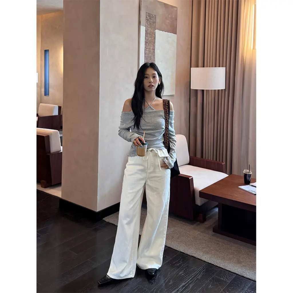 Damskie białe jeansy skinny z wysokim stanem i szerokimi nogawkami, luźne, zwiewne spodnie dżinsowe o prostym kroju do ziemi od Guangzhou Huang Zheng