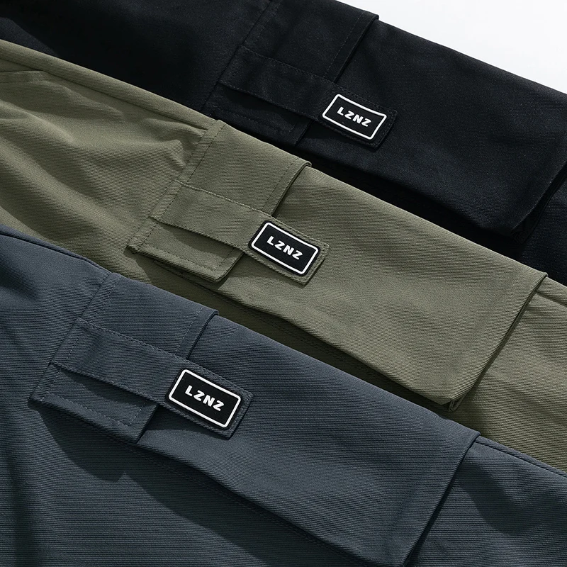 調節可能な巾着ゴムウエストバンド付きのメンズファッショナブルな巾着パンツ、ルーズフィット、マルチカラーのオールシーズン快適さ