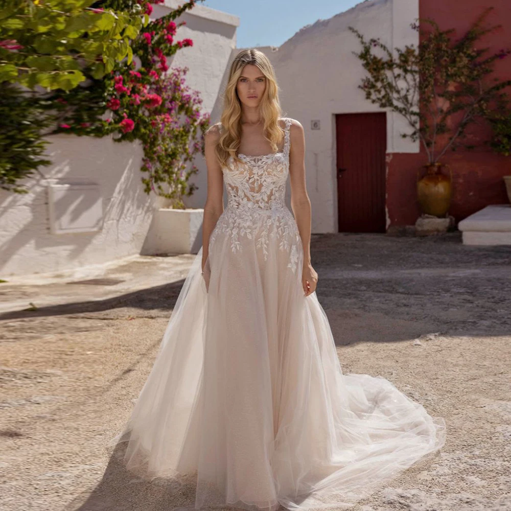 فساتين زفاف أنيقة عاجية مخصصة أشرطة سباغيتي زفاف مزينة بدون ظهر سويب تراين على شكل حرف a فيستدوس دي نوفيا #1