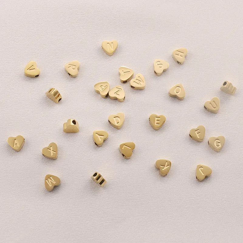 CARLIDANA High Polish Stainless Steel Silver Color 7*6mm Engraved Letter Alphabet Initial Perforated Heart Charm Accessories