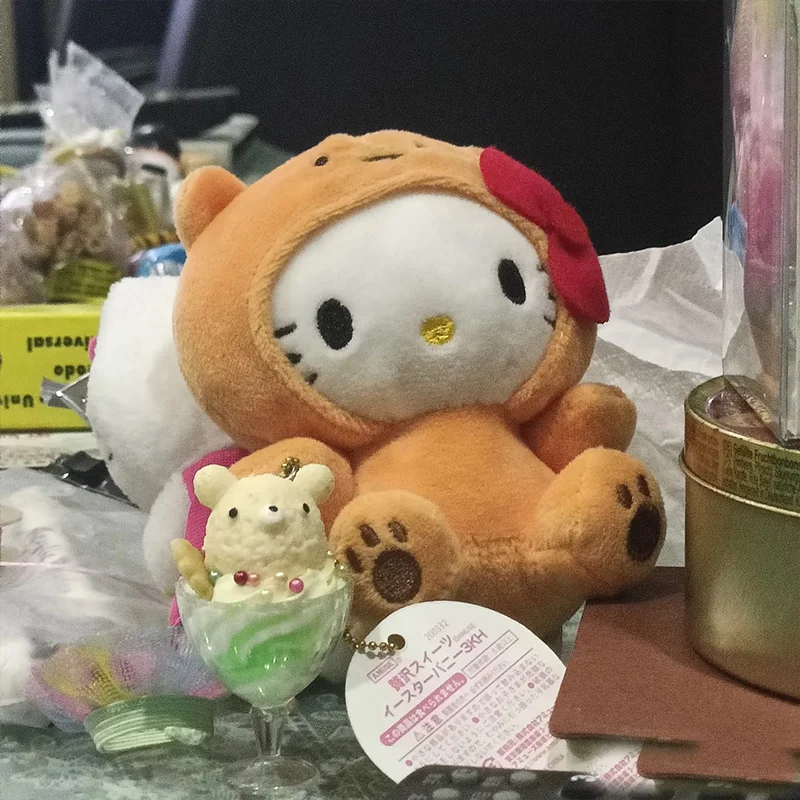 Kawaii Hello Kitty Panda Kt gato llavero de juguete de peluche Morphing Plushie muñeca Convertible monedero accesorio mochila encanto regalo