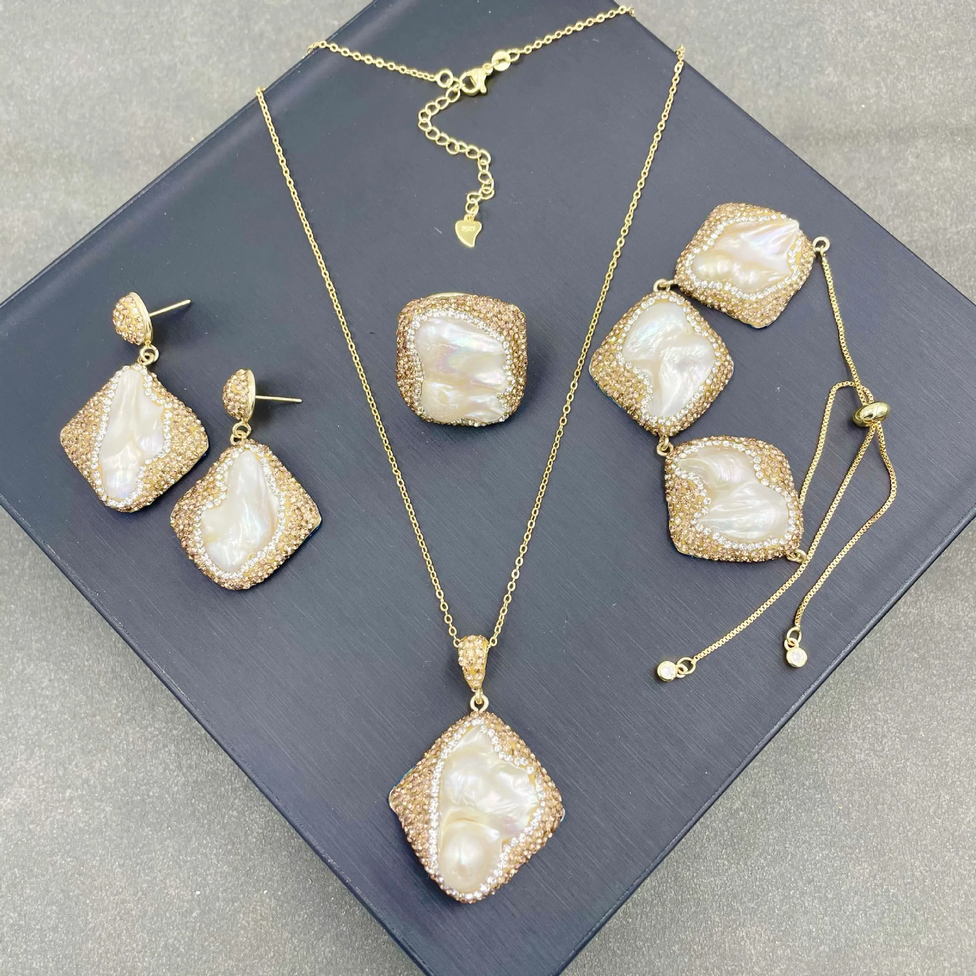 

Baroque special-shaped pearl exquisite retro point crystal four-piece set evening banquet jewelry pendant earrings ring bracelet