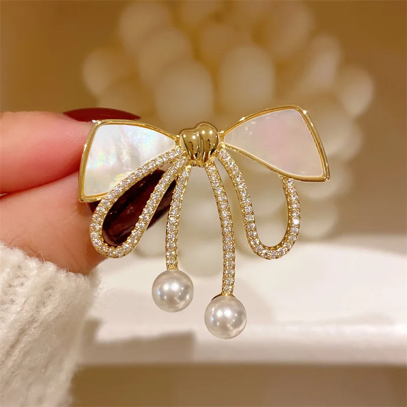 

Bowknot Brooches For Women Girl Fashion Jewelry White Shell CZ Shinestone Fine Clothes Pin Accessories Anniversary Party Gift