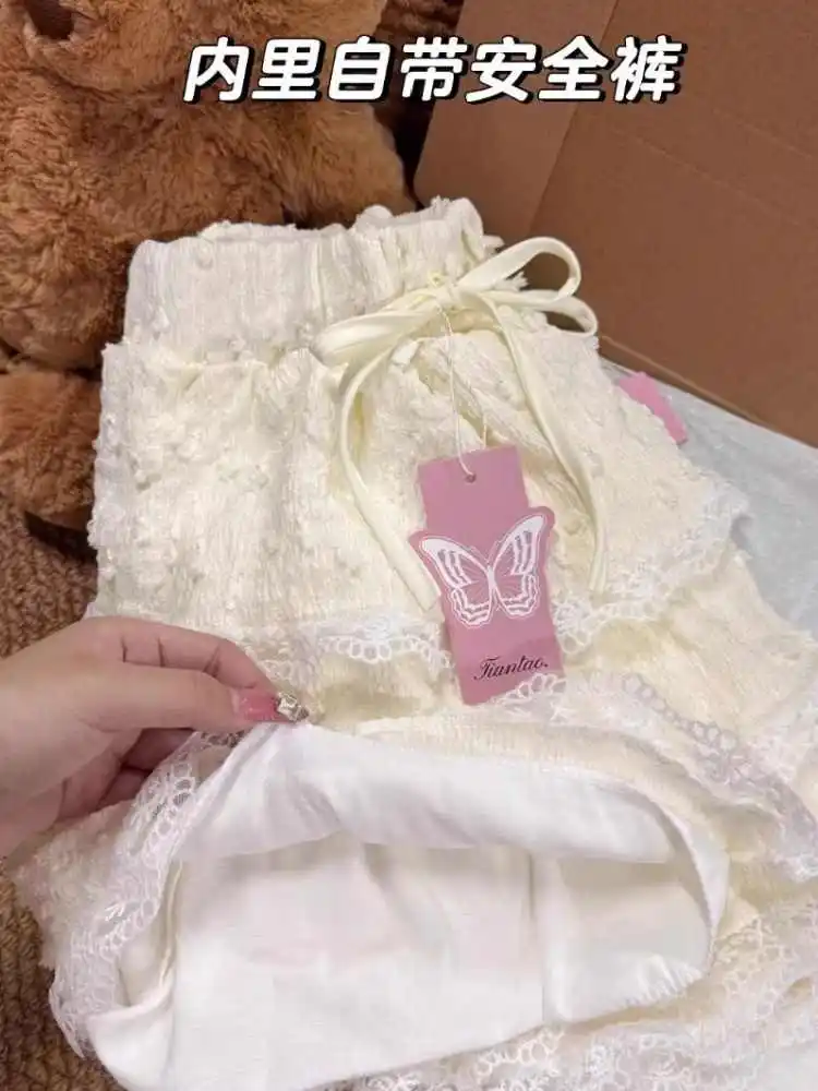 กระโปรงทรงเอไลน์สั้นแต่งผ้าลูกไม้สีแอพริคอตประดับโบว์สไตล์วินเทจ Y2k Gyaru สไตล์ฮาราจูกุ  สำหรับผู้หญิง  คอลเลคชั่น Cutecore  ฤดูร้อน  ปี 2000