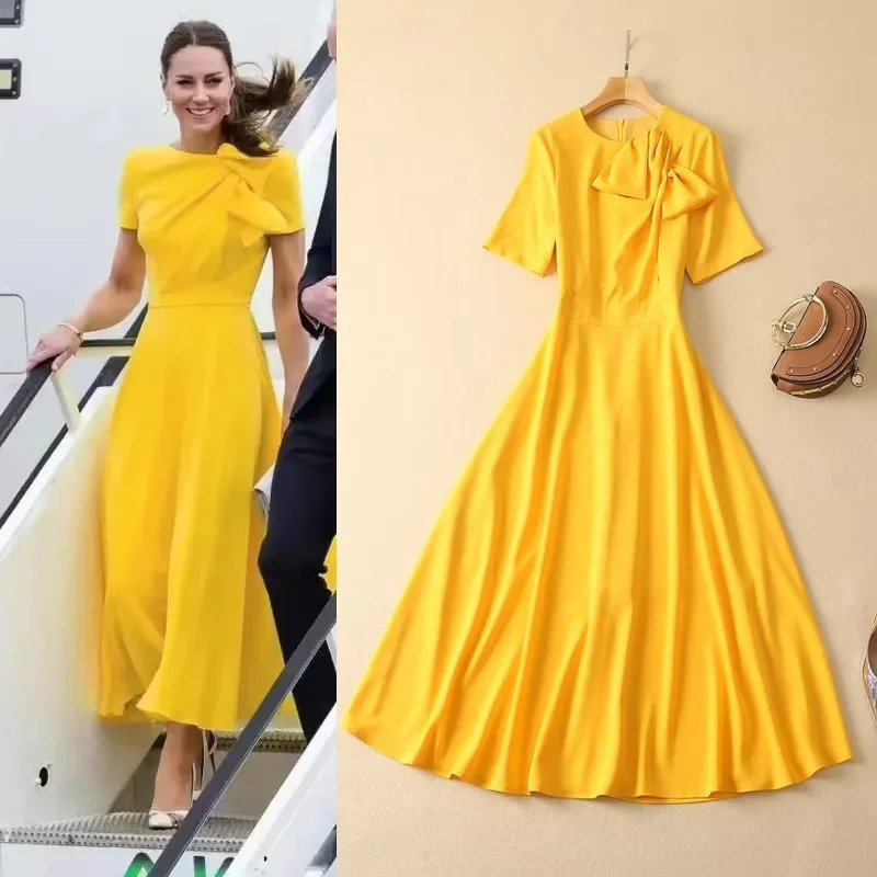 كيت ميدلتون رائجة البيع لموسم ربيع جديد المرأة جولة الرقبة قصيرة الأكمام فستان أصفر فراشة عقدة الخصر Cinching الركبة