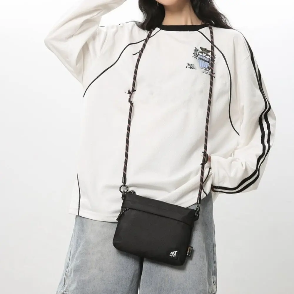 Portable Black Crossbody Bag Zipper Closure Adjustable Strap Shoulder Bag Mini Pouch Street Style Phone Pouch Streetwear Looks