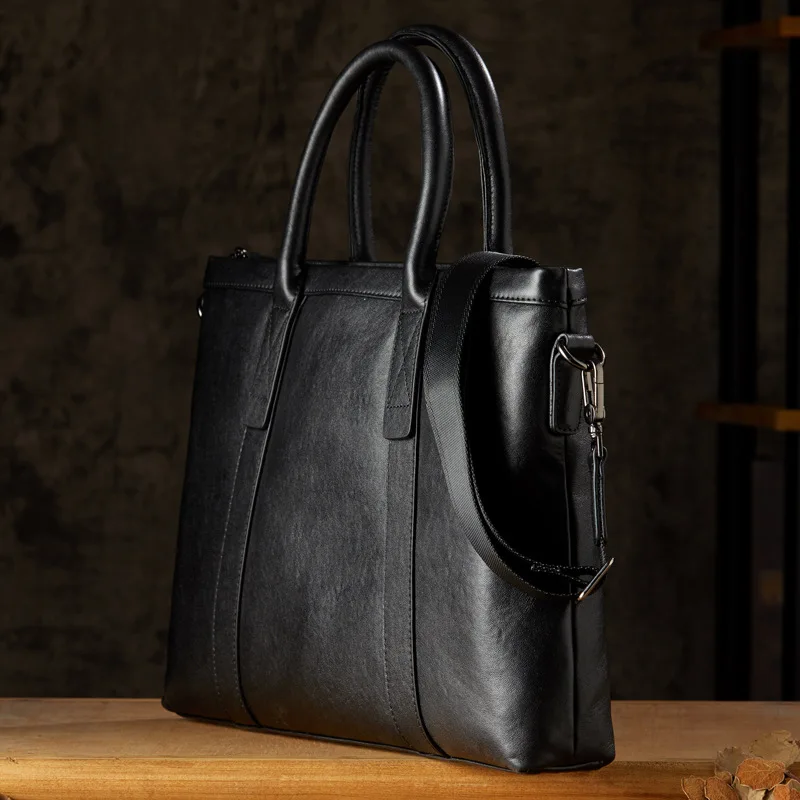 Sac à main d'affaires décontracté en cuir véritable noir pour hommes, sac pour ordinateur portable, couche supérieure simple, étui à bombes en cuir de vachette, sacs de messager lancés