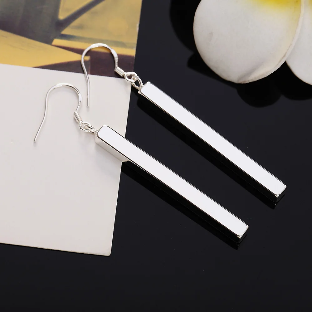 Korean version of silver jewelry, simple and personalized one word earrings, fashionable and grand party, wedding, birthday gift