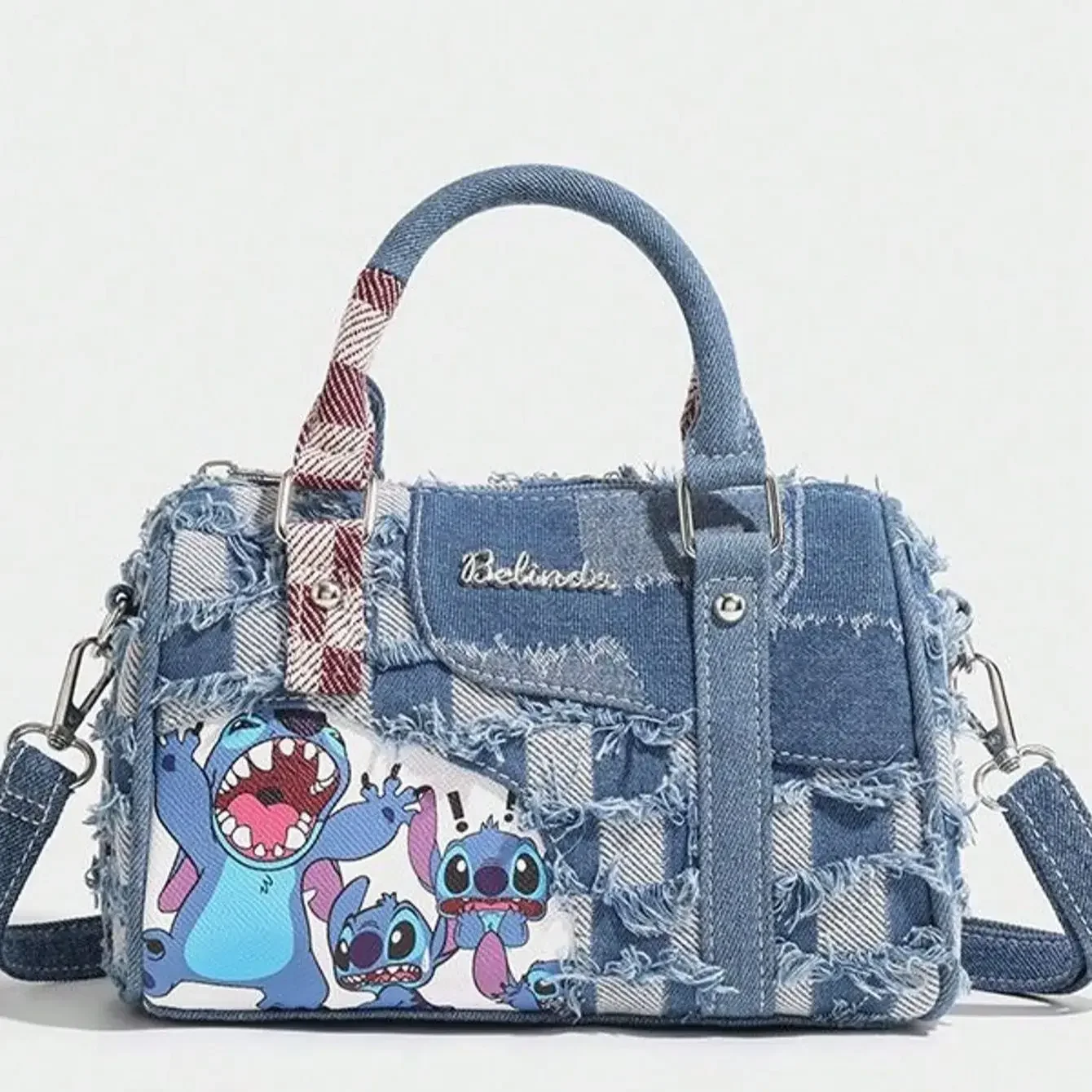 

Stitch cartoon stitched denim shoulder bag with hole stitching crossbody bag portable pillow bag casual fashion crossbody bag