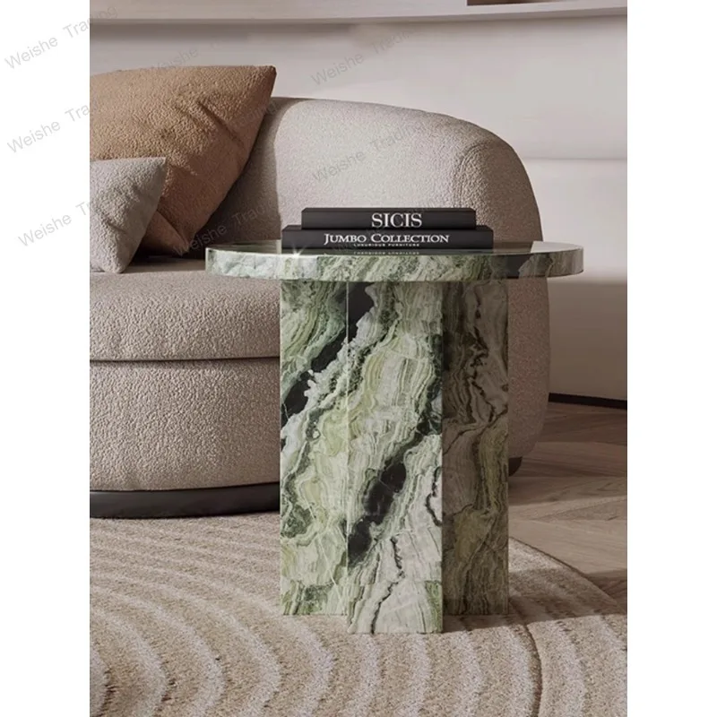 A few jadeite marble corners and luxury stone furniture on the sofa side of the living room