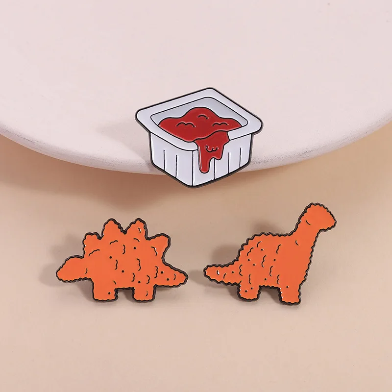

Fried Dinosaur Brooch - Cute Animal Metal Badge with Chicken Nugget Cookie Ketchup Design, Food Theme Enamel Pins Accessories