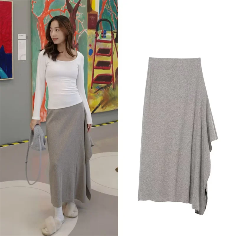 تنورة نسائية ميدي 2025 شتاء جديد رمادي غير متماثل ديكور ممزوج تنورة ميدي أنيقة وأنيقة