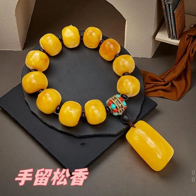Yellow , single-strand amber square pendant bracelet