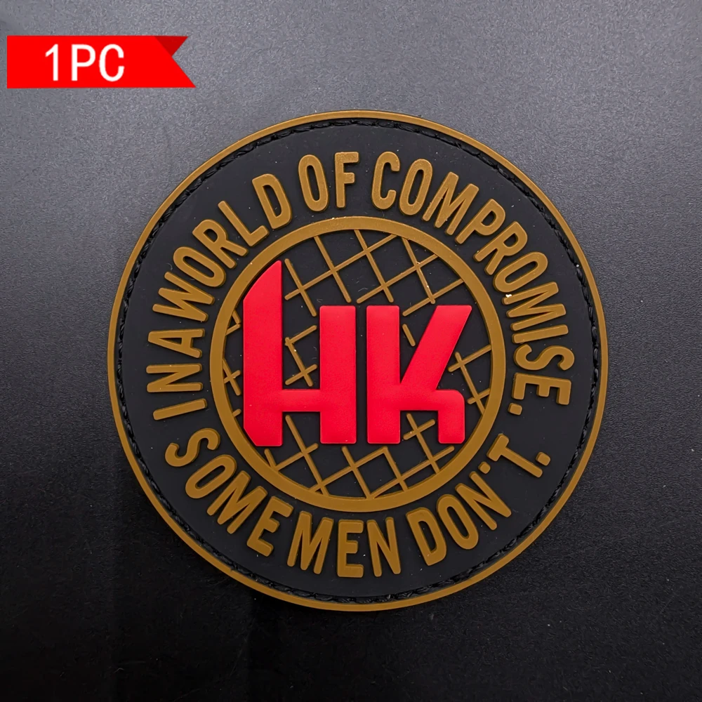 Black background with circular rings surrounding a layered grid pattern of letters, made of 2D flat PVC material, features a built-in glow-in-the-dark effect, supports repeated application and removal, and is a versatile accessory for personal identification on armbands, bags, and clothing. Comes with a compatible velcro badge
