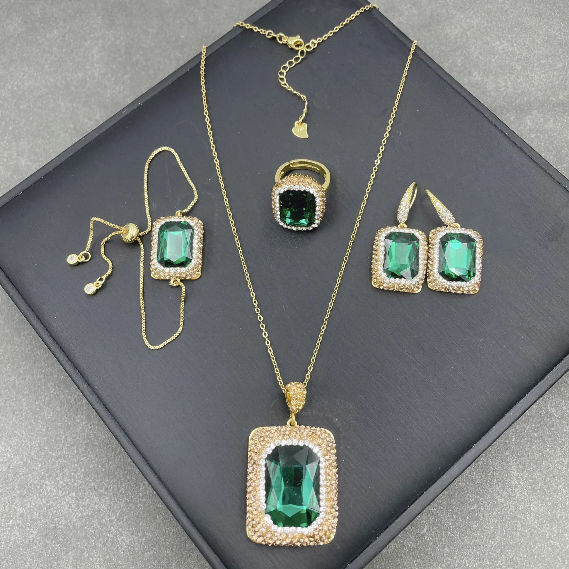 

S-warovski's new crystal set exquisite point crystal handmade simple atmosphere four-piece set, pendant earring ring bracelet