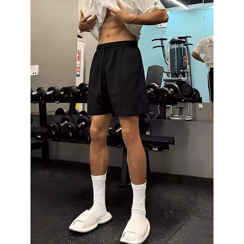 Men's Quick Drying Sports Shorts Thin Loose Running and Fitness Training Pants Solid Color Drawstring Straight Shorts 3 Colors