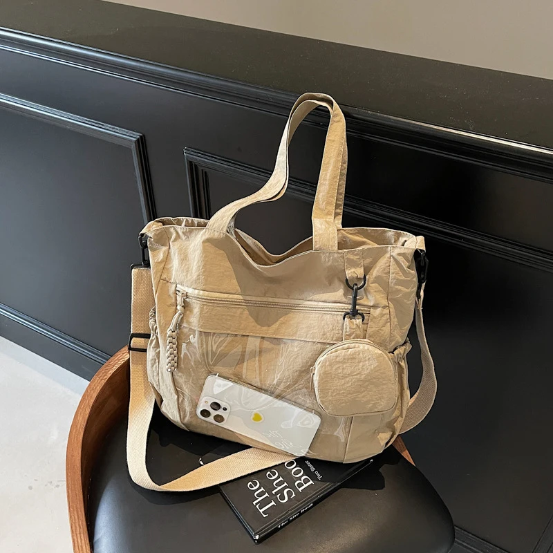 

Повседневная большая сумка для женщин 2025: Новая стильная универсальная сумка через плечо, вместительная сумка-тоут, подходит для занятий и поездок на работу.