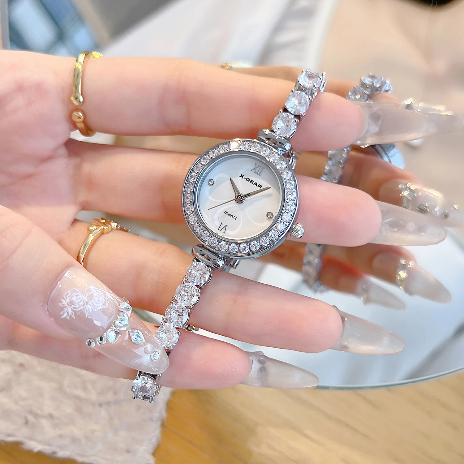 

Женские часы X-GEAR с роскошными вставками из циркония, маленьким циферблатом, ремешком из нержавеющей стали, кварцевые наручные часы