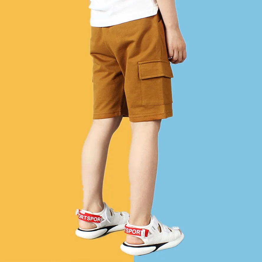 

Повседневные пляжные шорты для мальчиков с несколькими карманами, новинка 2023 года, летние детские однотонные брюки-карго для детей от 4 до 13 лет
