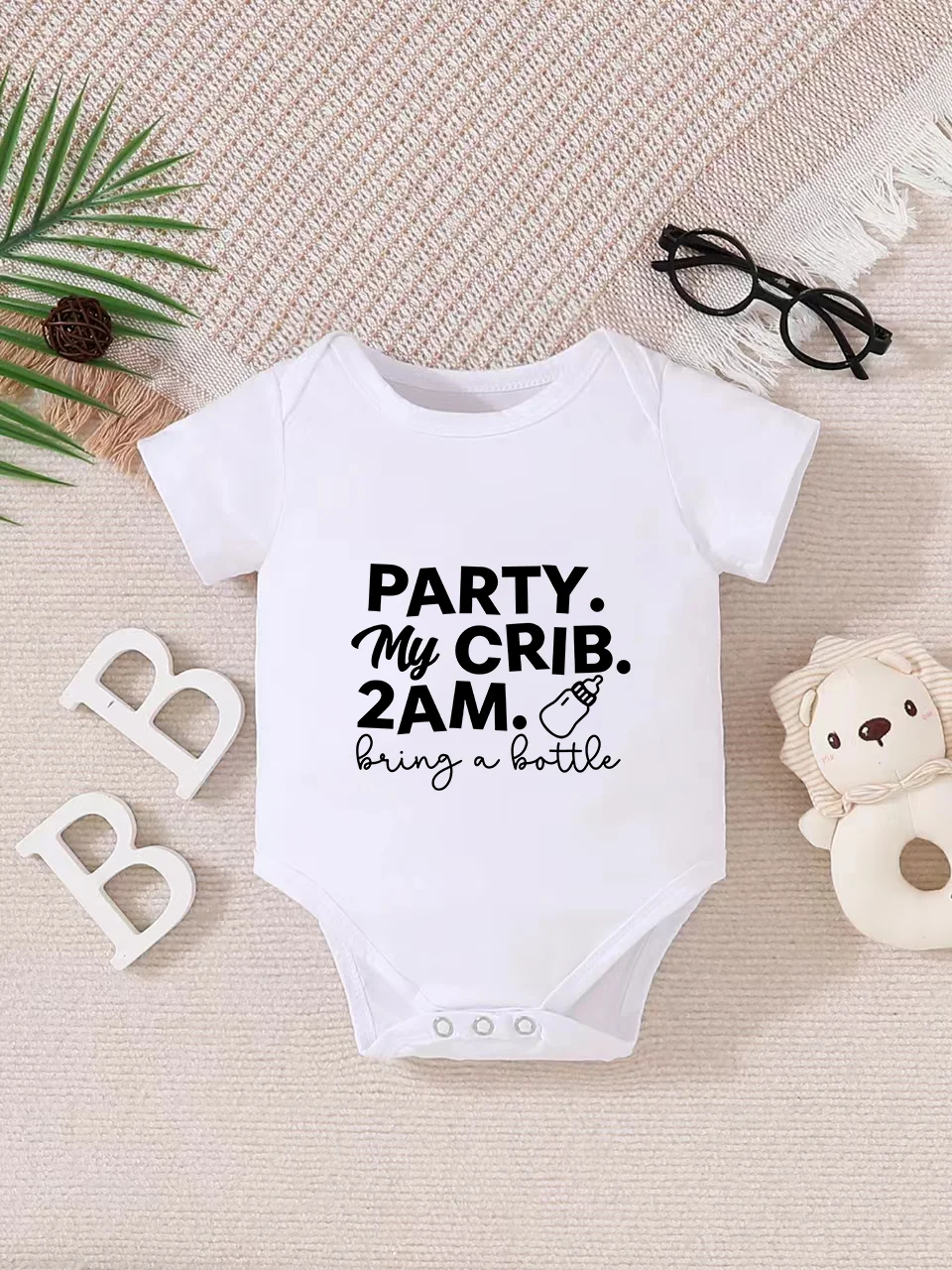 Picture 3: Playful letter-printed baby short-sleeve triangle bodysuit. Button closure for easy dressing, machine washable