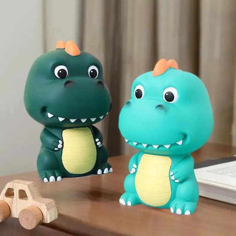 魅力的な恐竜の形をした金庫。ビニールの貯金箱。女の子への誕生日プレゼントに最適です。