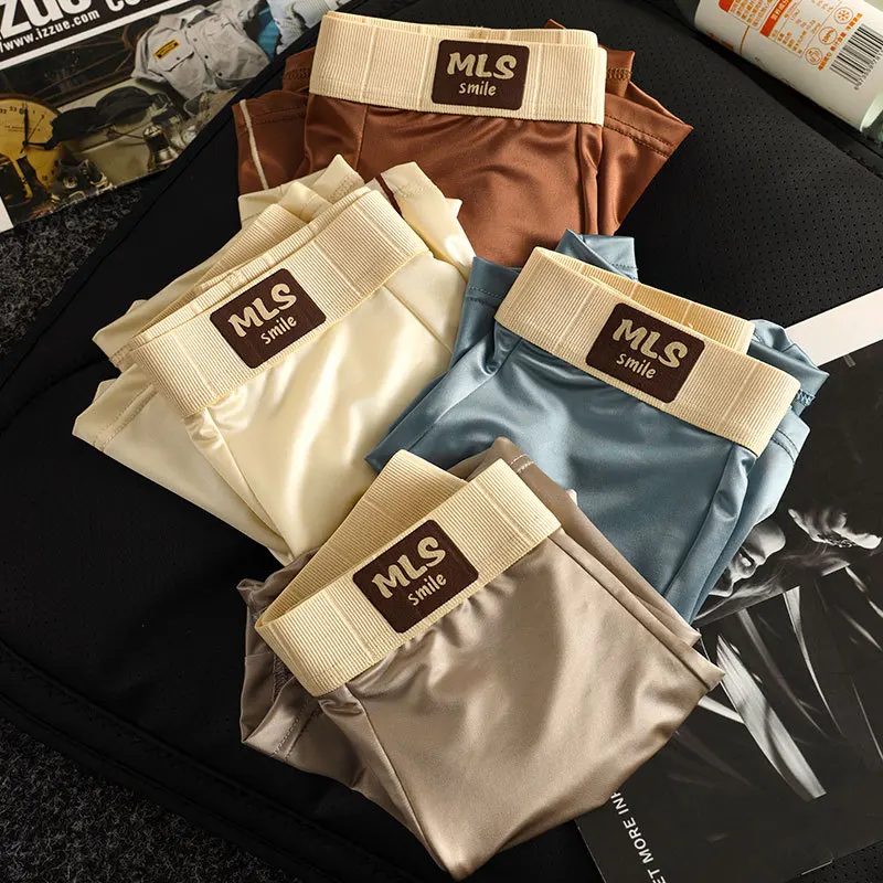 Ropa interior suave de seda de hielo de lujo para hombre, calzoncillos Boxer sexis transpirables tipo satén, calzoncillos con bolsa para bulto en U, bragas de secado rápido