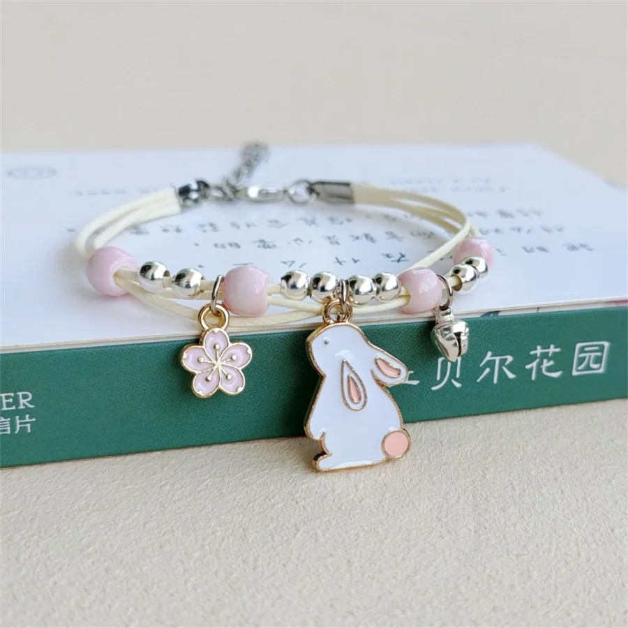 Koreanische niedliche Cartoon-Kaninchen-Blumen-Anhänger-Armbänder für Damen, modischer Charm-Glocken-Schmetterlings-Katzen-Armband, Freundschaftsschmuck – Detail 23