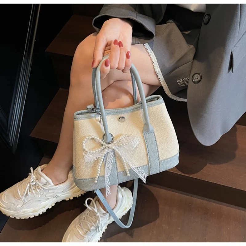 Bolsos de mano para mujer a la moda hechos de cuero con patrón de lavanda con estilo moderno diario suave y espacioso refinado de París informal ​