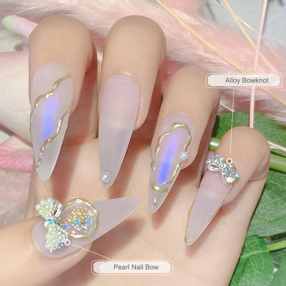 10 sztuk/torba brokatowe srebrne łuk Nail Art urok 3D kryształ szklany kamień Pearl Bowknots biżuteria do paznokci DIY żel UV akcesoria do Manicure