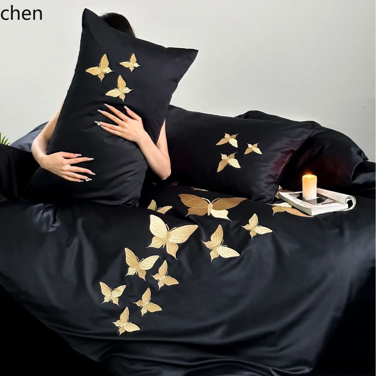 HXL all-black colorway four-piece set with glass butterfly embroidery, suitable for all seasons